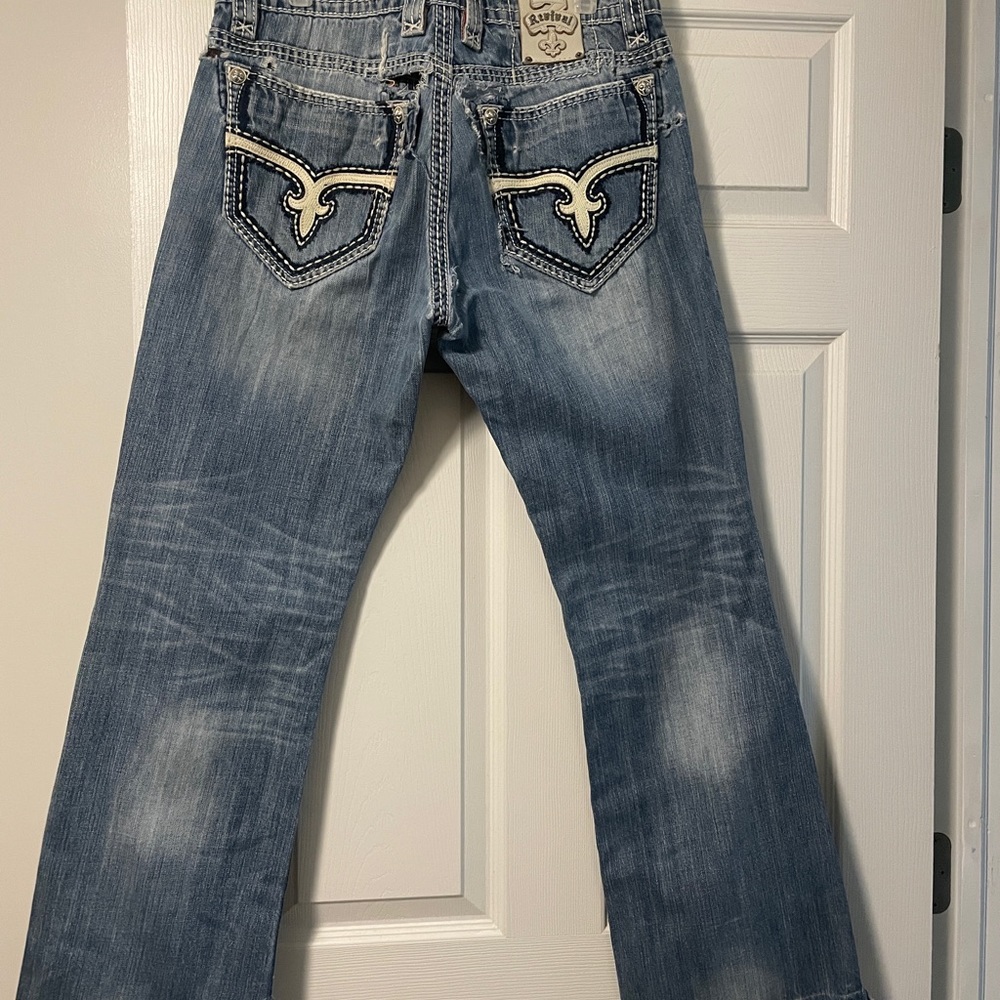 Great pair of SUPER DISTRESSED Rock Revival jeans
